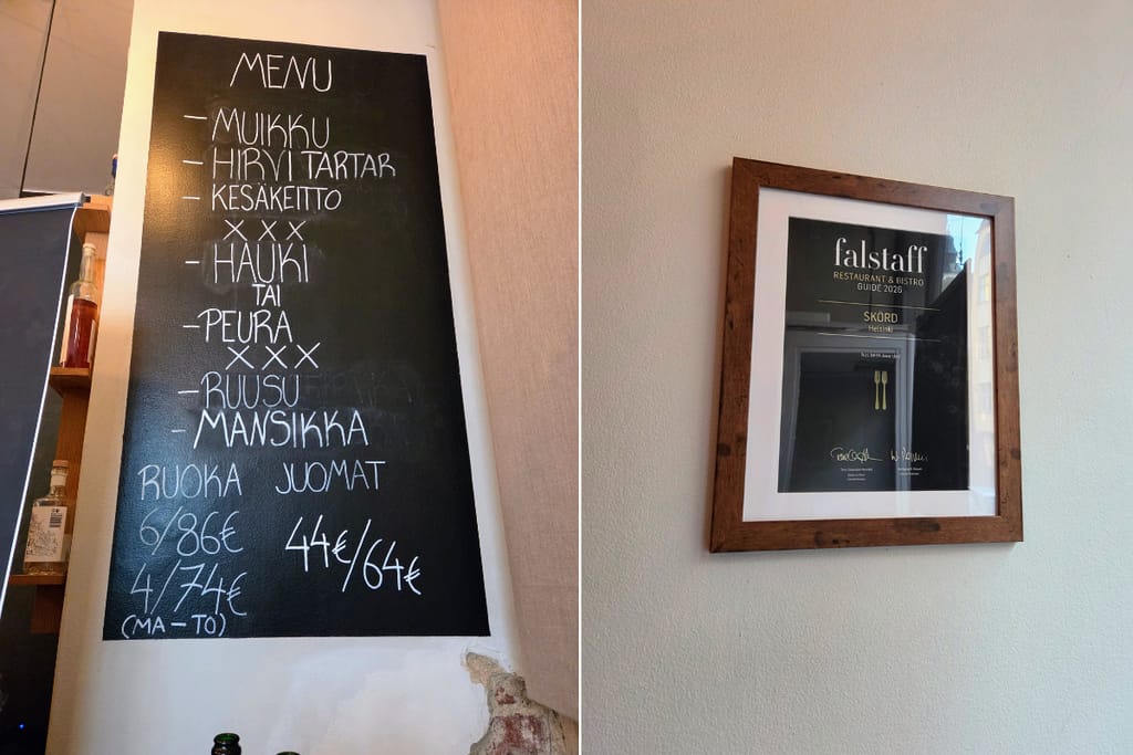 Ravintola Skördin menu ja kunniakirja seinillä.